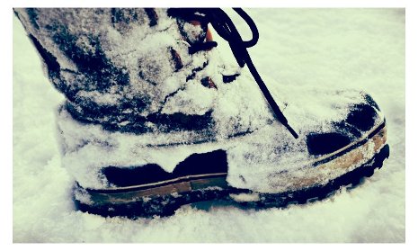 Winter boot in the snow.