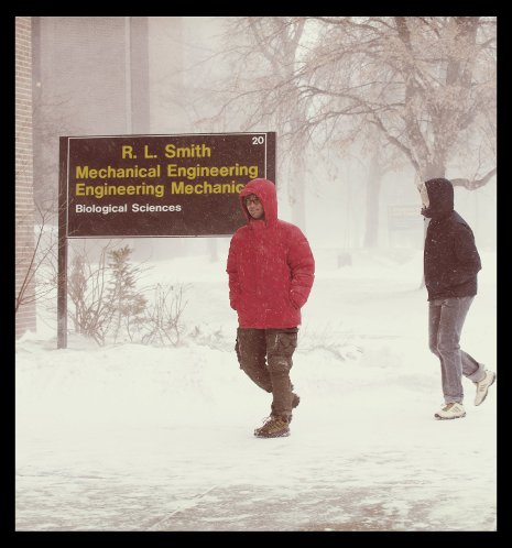 Students walking through campus in the winter.