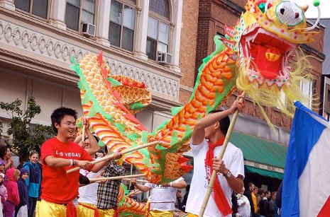 Chinese students and their dragon march in the Parade of Nations. 