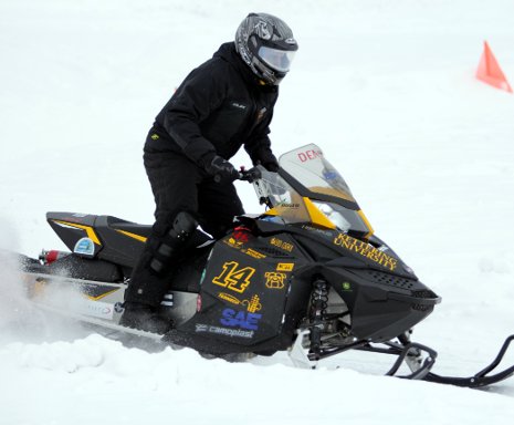 The University of Kettering's four-stroke sled took first place at the 2014 SAE Clean Snowmobile Challenge, held at Michigan Tech.