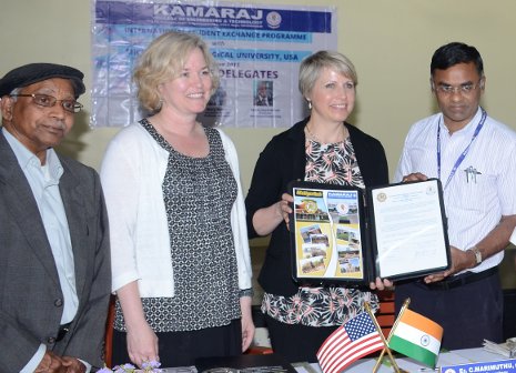From left, Gopal Jayaraman, Mary Raber and Lorelle Meadows from Michigan Tech, pose with O.M.S.P.C. Marimuthu of Kamaraj College of Engineering and Technology at the signing of a MOU between the two schools. 