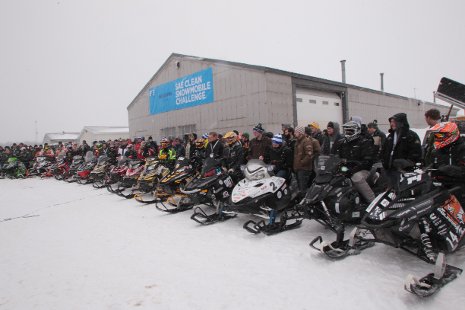 Teams competing in the Clean Snowmobile Challenge line up at the Keweenaw Research Center