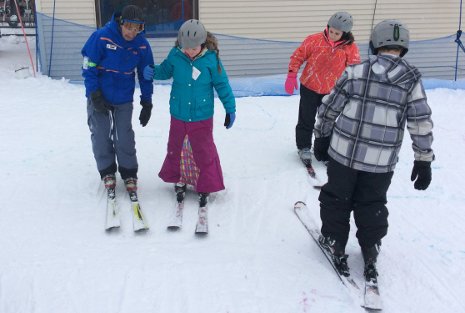Children from the Keweenaw Bay Ojibwa Community College Youth STEM Academy learn to ski on Mont Ripley.