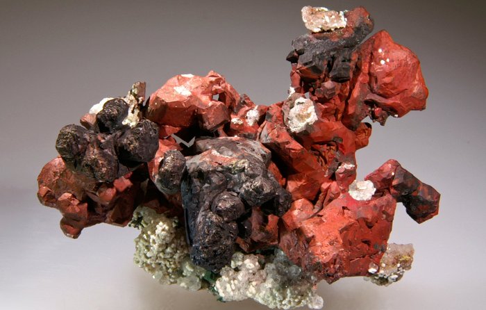 A copper specimen from the Phoenix Mine in Keweenaw County. The red color comes from a thin coating of the mineral cuprite.  Photo:  Debra Wilson