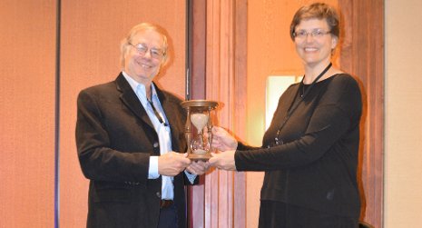 Greg McKennon, past president of the Society of Rheology, presents Michigan Technological University Chemical Engineering Professor Faith Morrison with the Distinguished Service Award. The presentation was made last month in Baltimore.