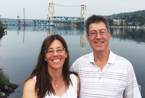 Schneiders Establish Professorship, and Postdoctoral Support Liza and Donn Schneider are seen on the Houghton waterfront. The couple, from Green Bay, have established an endowed professorship and postdoctoral fellowship support in Michigan Tech's Department of Computer Science.