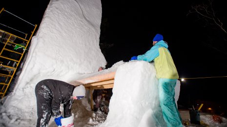 Michigan Tech student groups are crafting enormous snow statues for Winter Carnival. 