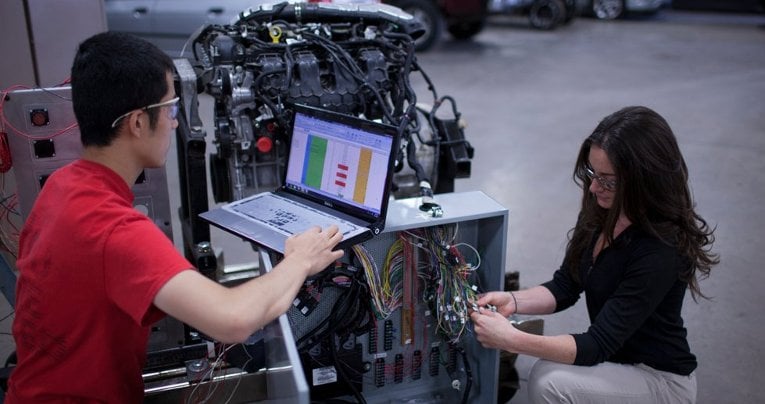 LD Engine Consortium - Students Phd candidate Simon Wang and undergraduate Katy Hickey setting up an open-architecture control system for engine combustion system development.