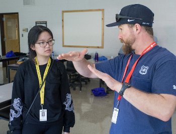 WIE Instructor Grace Liu talks volcanology with Hans Lechner, instructor for WIE's Geological Engineering group project Mud 'n' Fire.