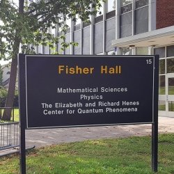 Exterior of Fisher Hall with students, location of the Elizabeth and Richard Henes Center for Quantum Phenomena
