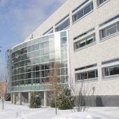The outside of the J Robert Van Pelt Library in the winter