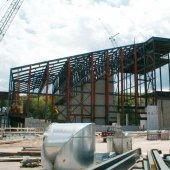 Metal steel structure of the Rozsa during construction with some walls going up