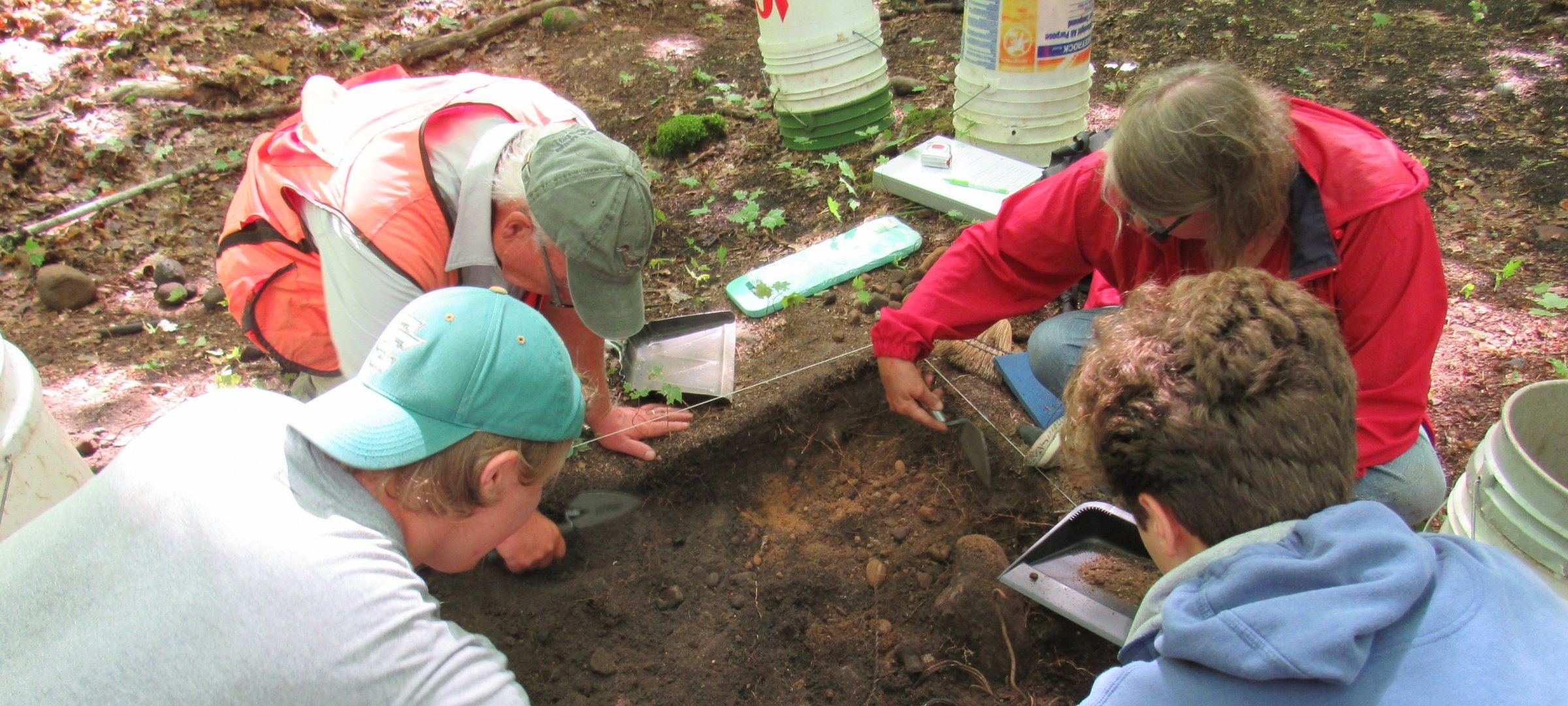 Students digging for artifacts during summer field school
