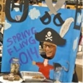 Student in a pirate-themed photo booth.