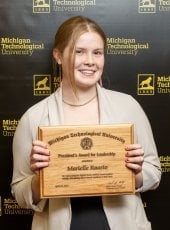 Meredith Raasio with the President's Award