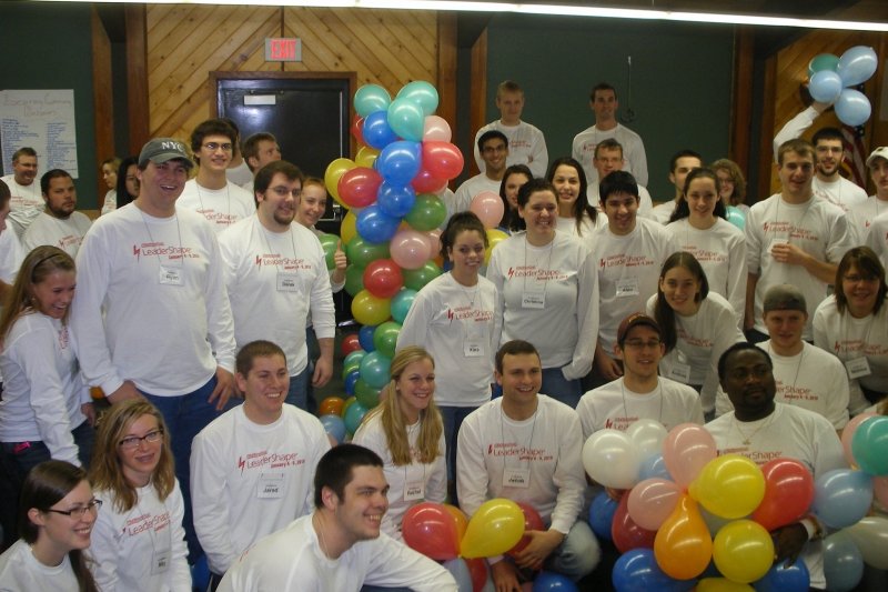 2009 group photo with balloons.