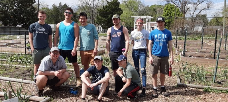Students group in the garden.