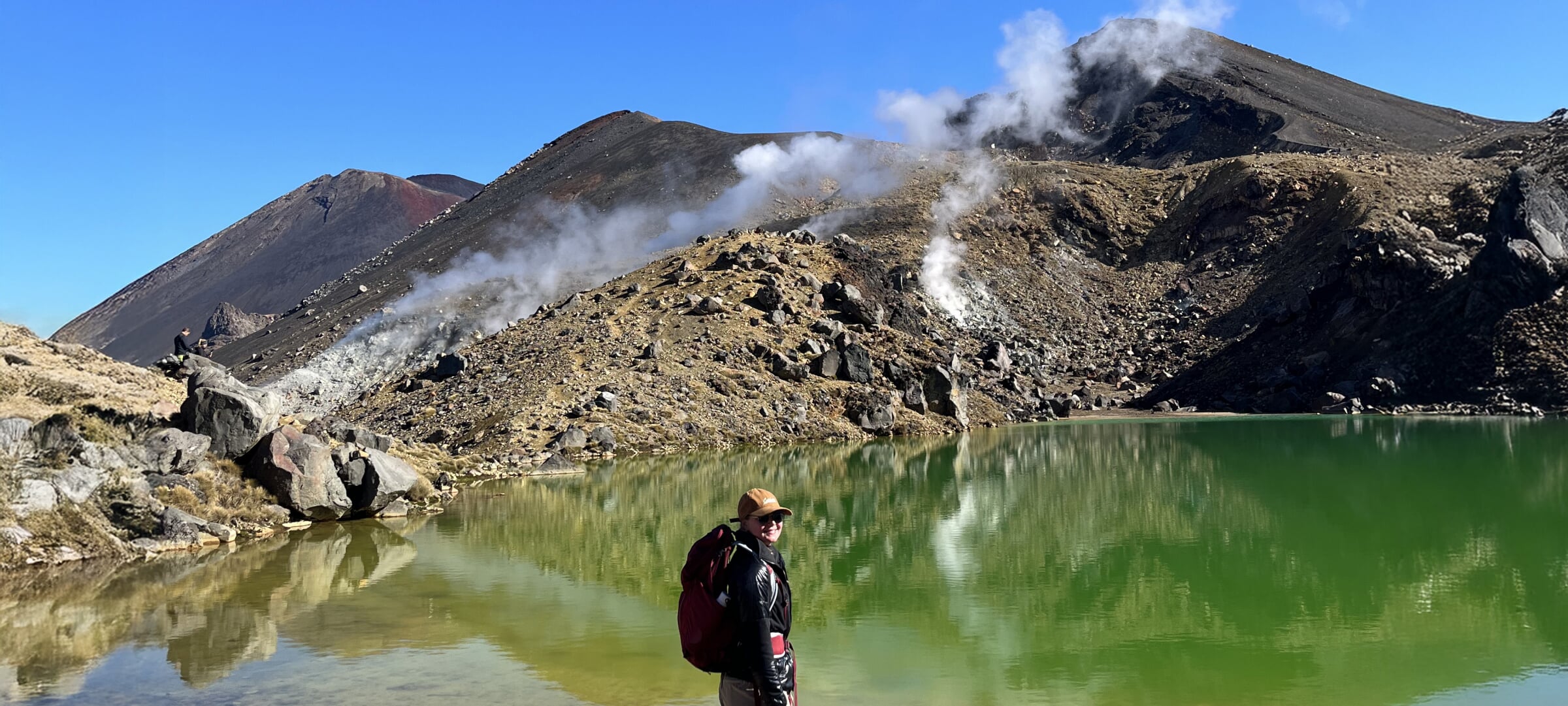 Student standing near a volcano in New Zealand