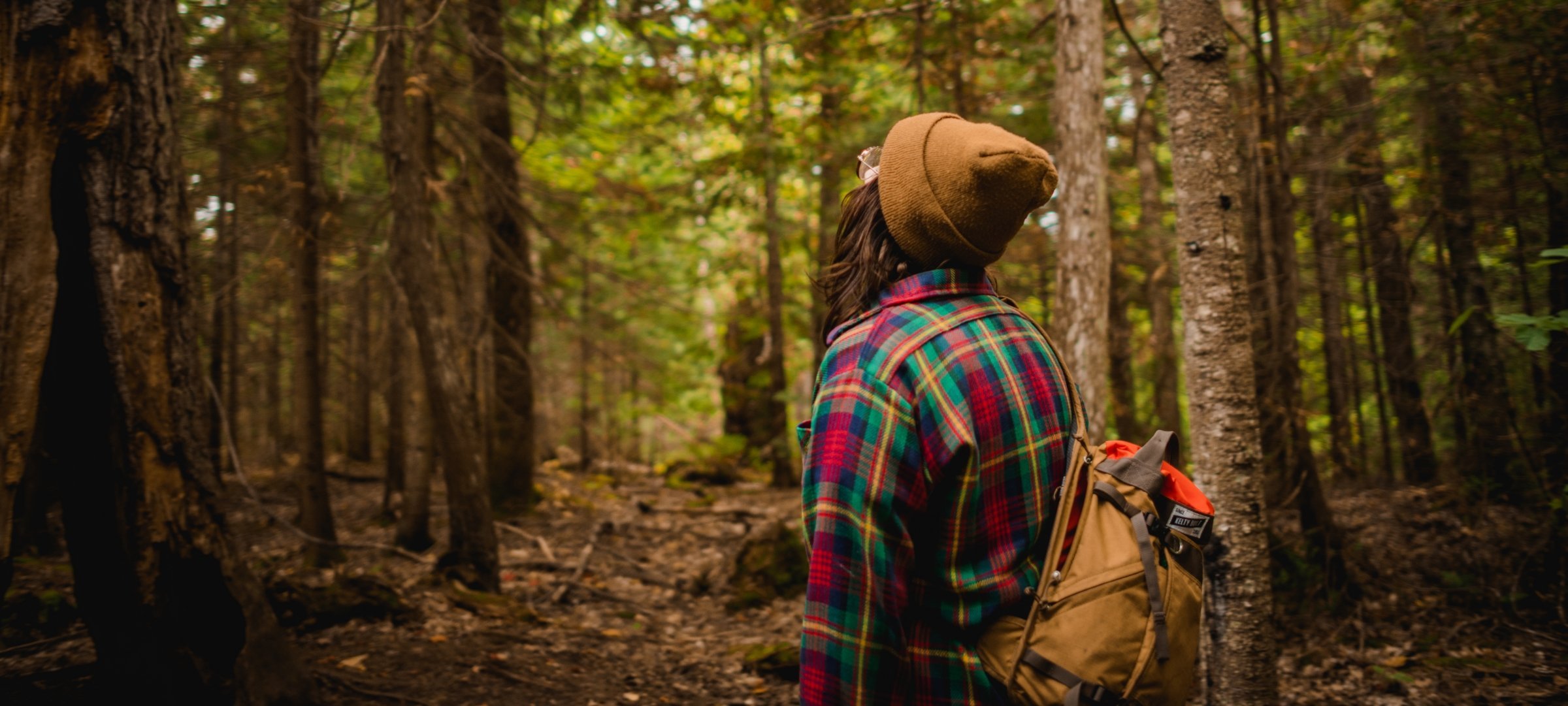 A student hiking near campus