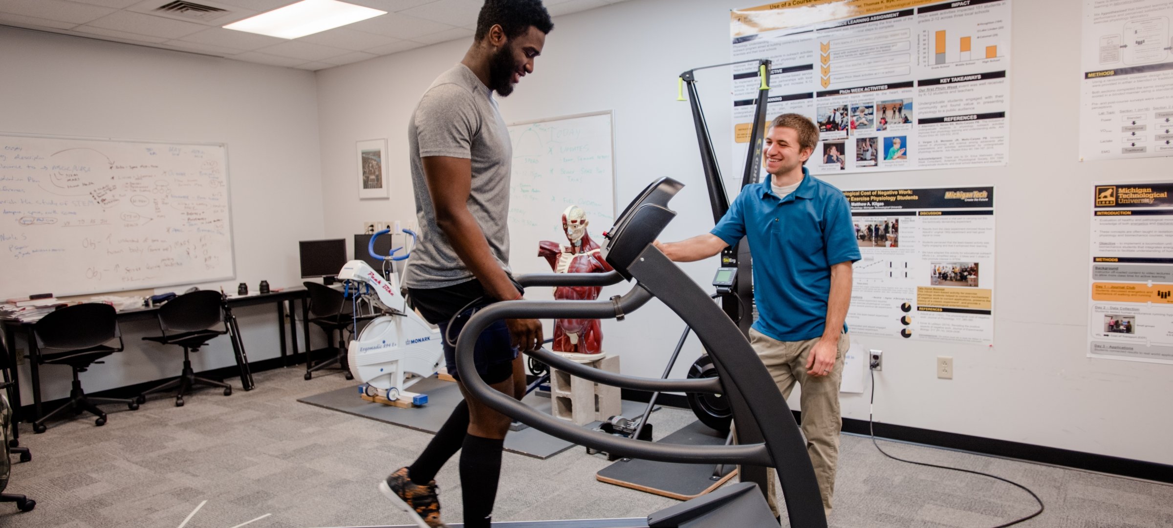 Exercise science students conducting research.