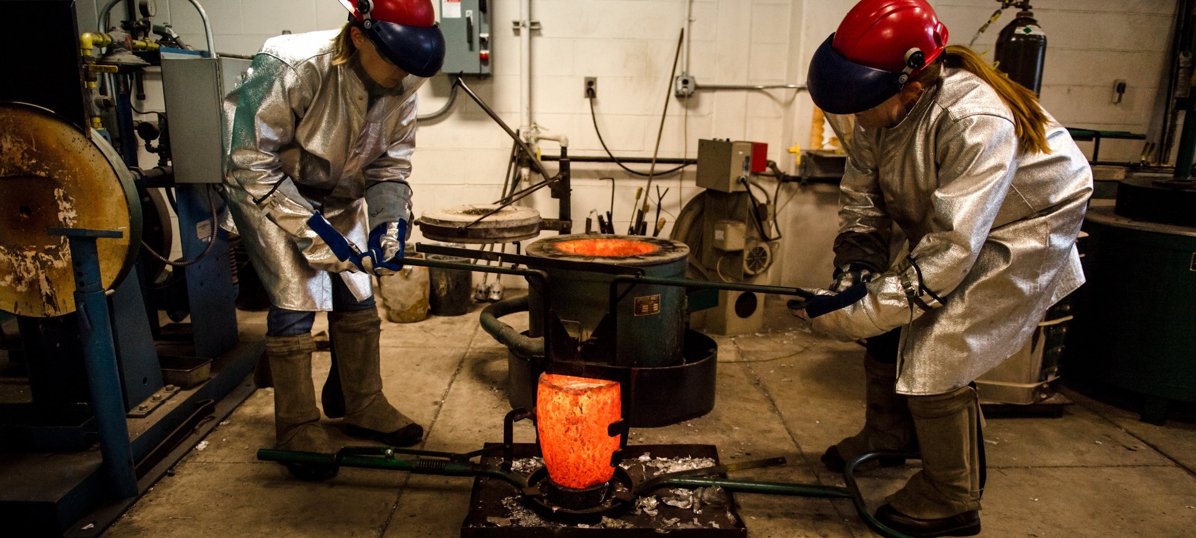 Materials science students working in the foundry.