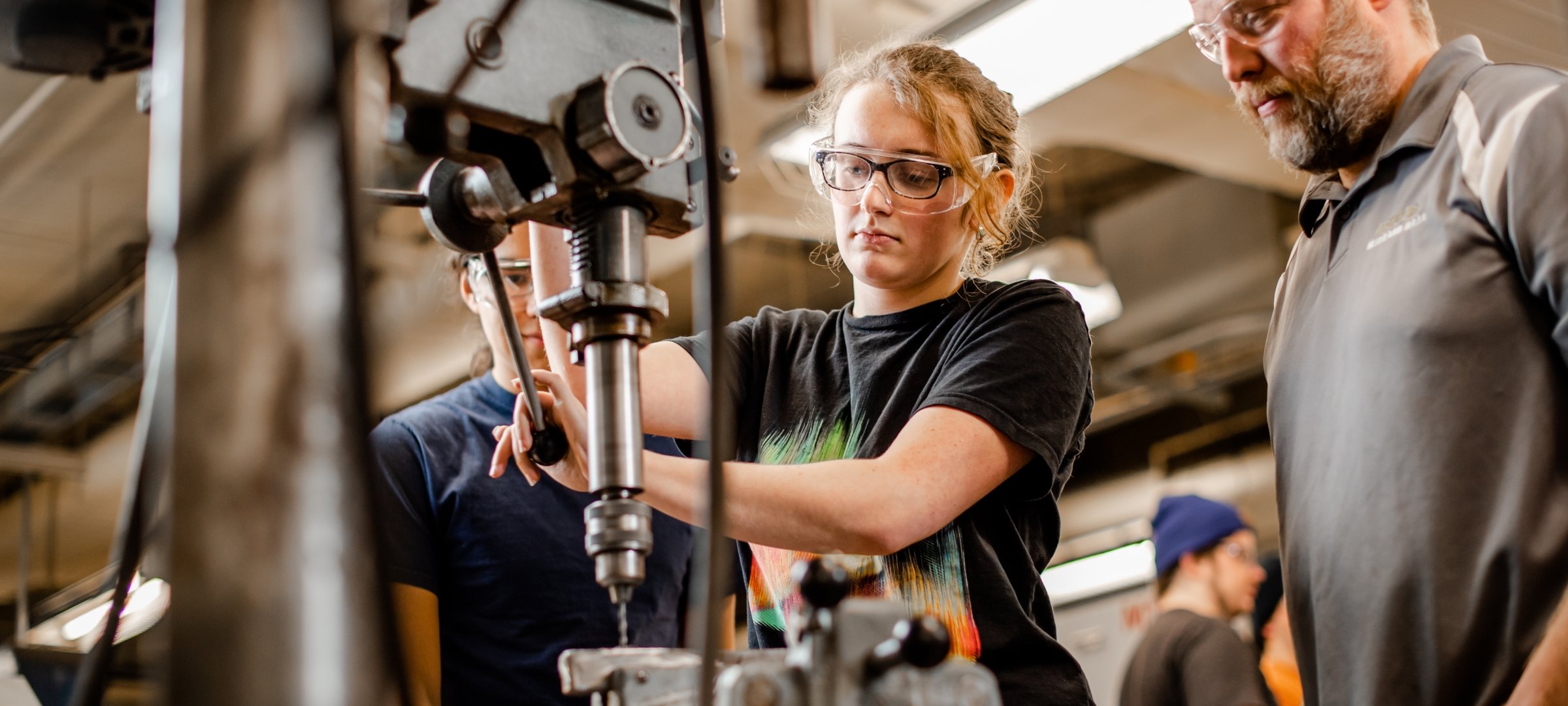 Mechanical Engineering Tech student working with machinery.