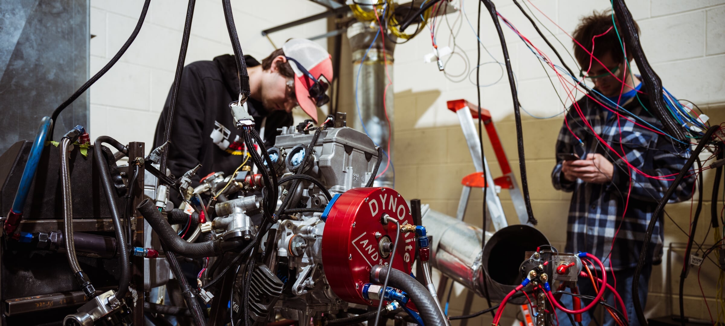 Mechanical Engineering students working in a lab.