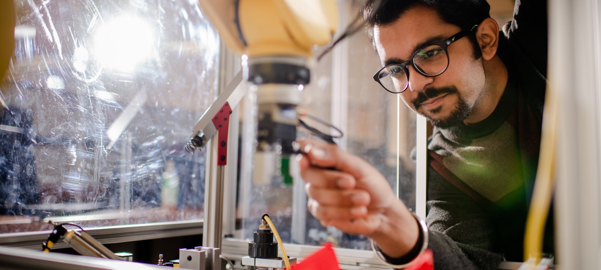 Mechatronics student working in lab