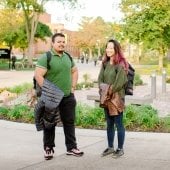 Students standing on campus