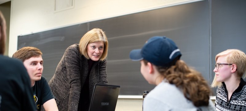 Students with faculty member.