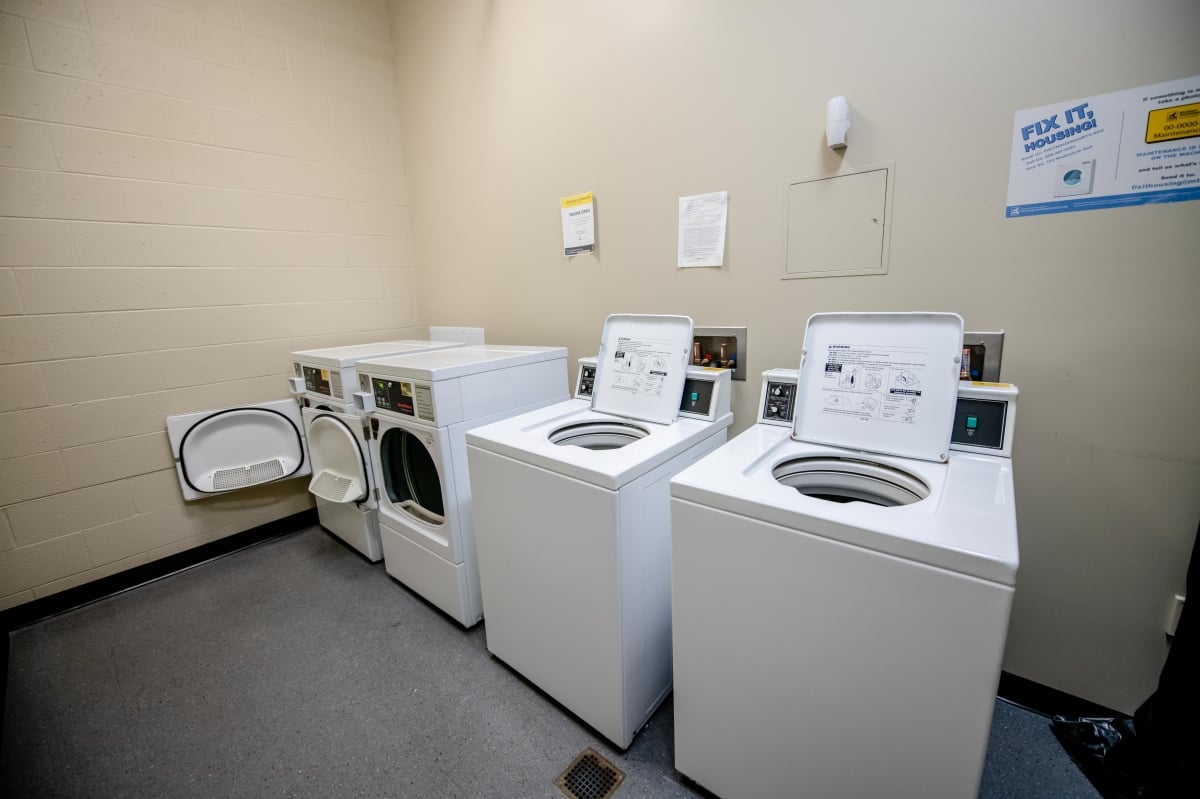 Washers and dryers in the laundry room.