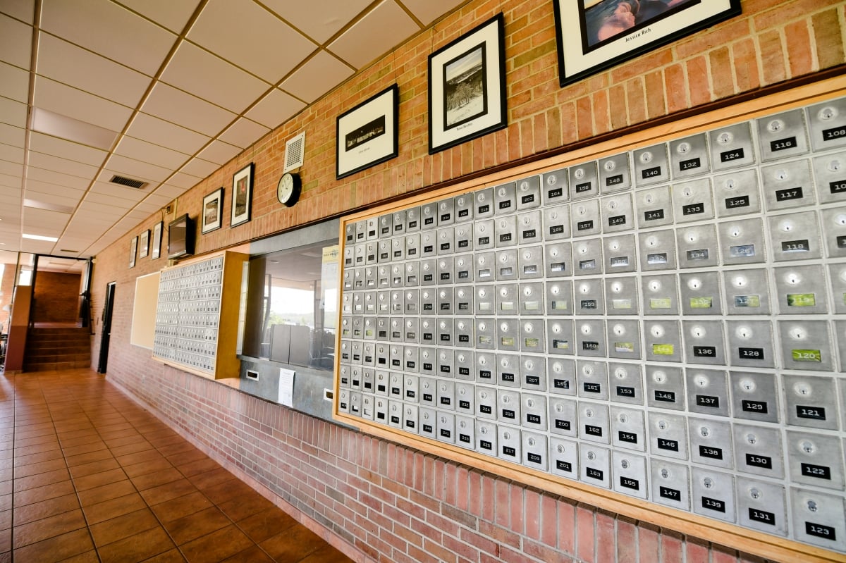 Mailboxes around the front desk window.