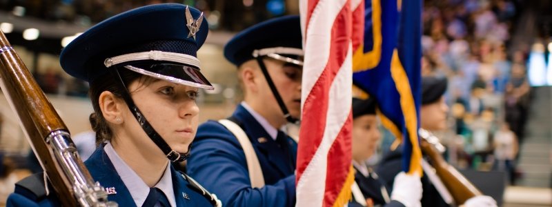 Air Force and Army Color Guard carrying the flags at commencement.
