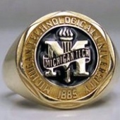 Gold and black class ring
