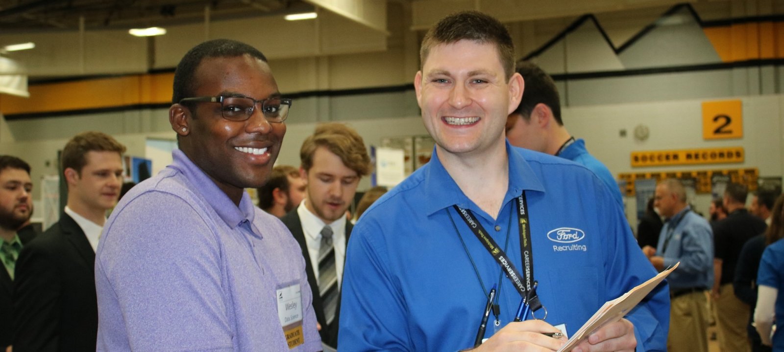 Michigan Tech alumni recruiter at Career Fair