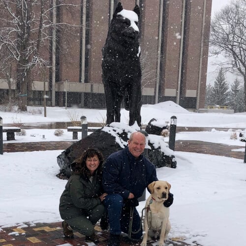 Tina and Gary Schmiedel at the Husky statue