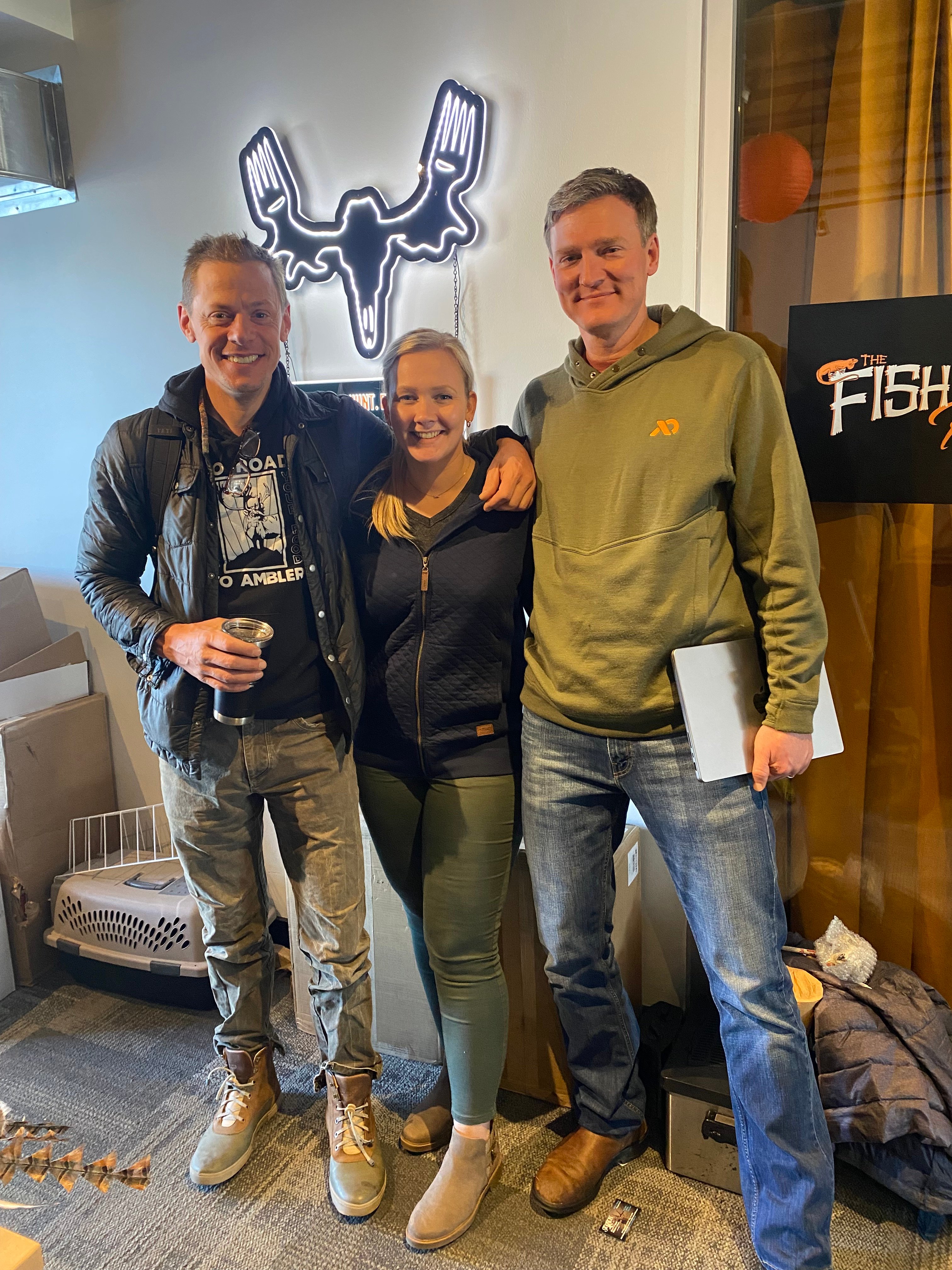 Megan Baker '15, stands for a photo with MeatEater television show and podcast host Steve Rinella after appearing on an episode.