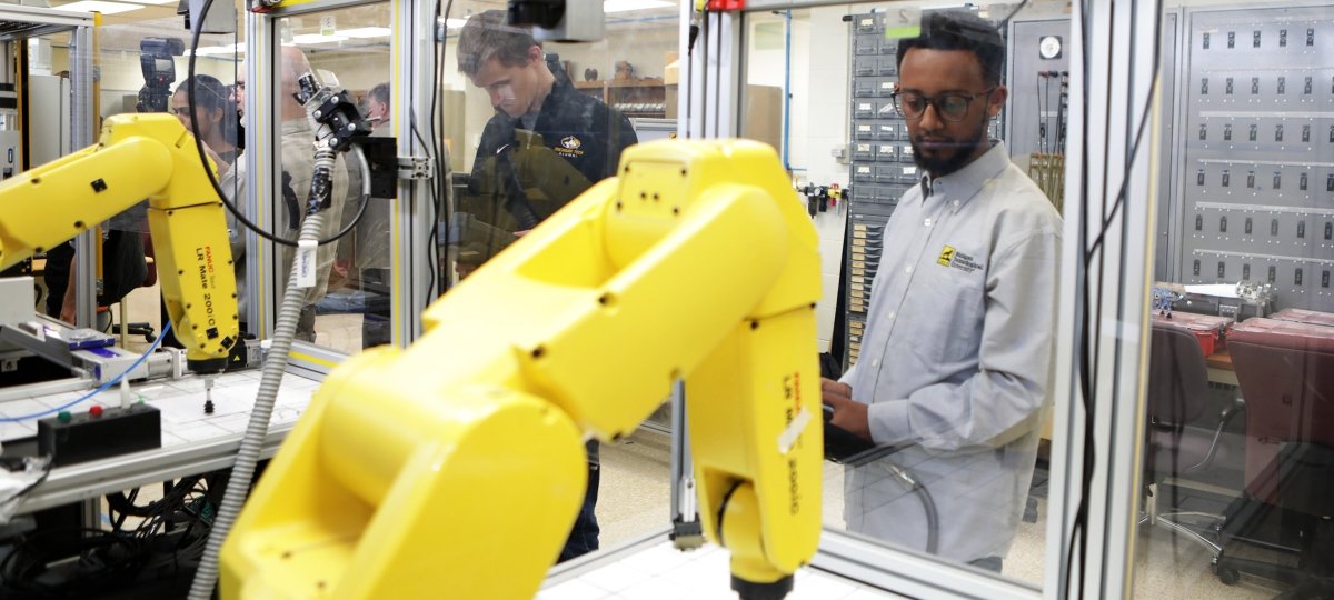 Applied Computing graduate students in the Mechatronics lab