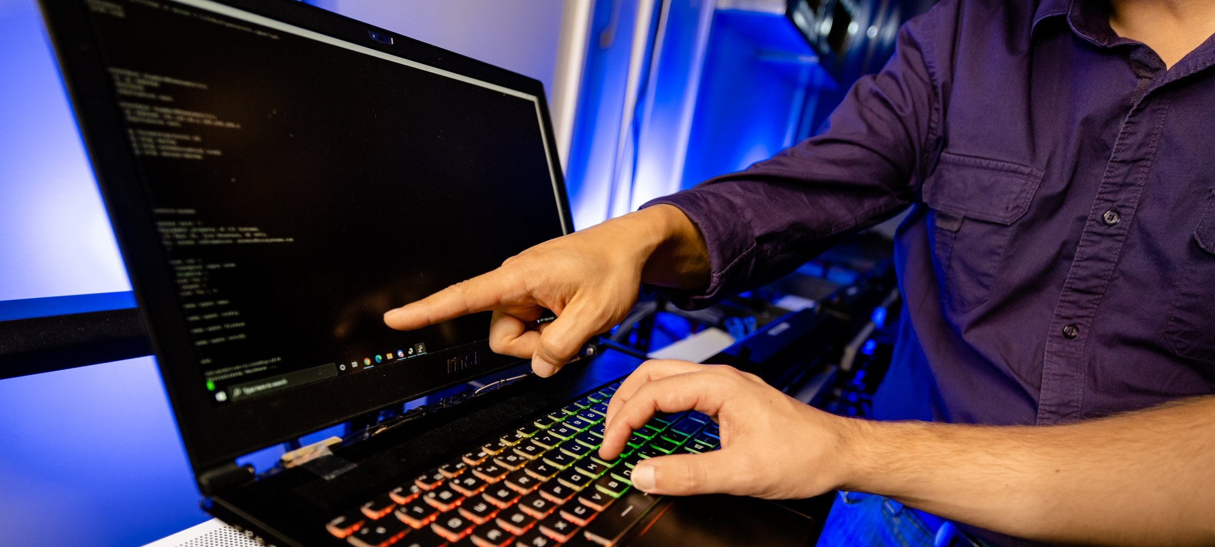 Researcher working on a server.