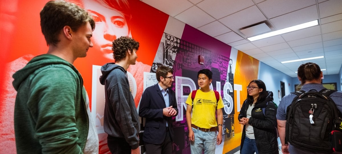 Faculty with students inside Computing Department.