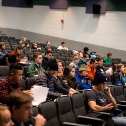 Students sitting in a lecture hall during class