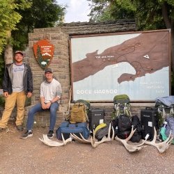 SOAR Enterprise students standing next to a National Park sign