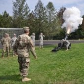 Cannon Crew firing the Howitzer Cannon