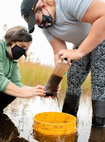 Amy taking samples at a pond