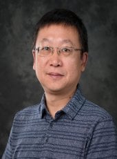 Xiaohu (Mark) Tang