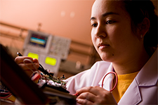 Woman Soldering