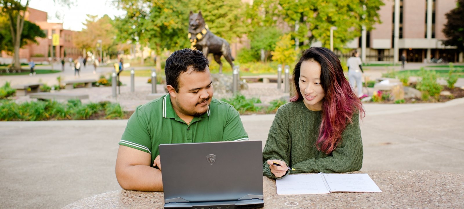 Image of male student receiving career advice at Michigan Tech