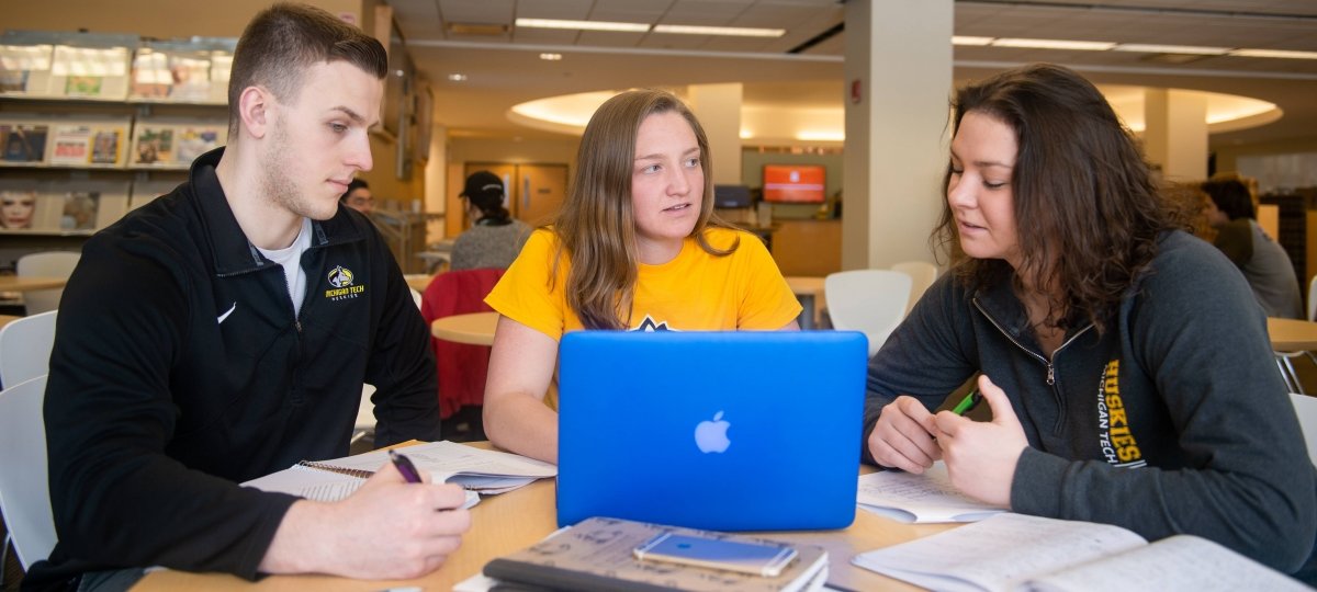 Students working together at a table.