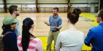 Roger Woods talking to his students