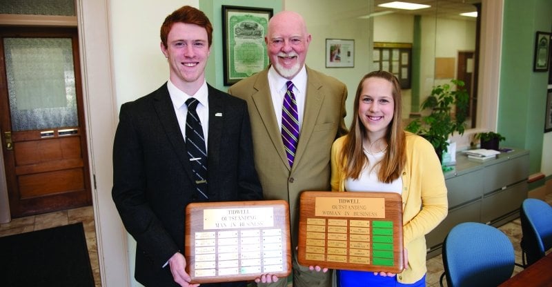 Heath Johnson and Rebeka Horsch being presented the Sam TIdwell award